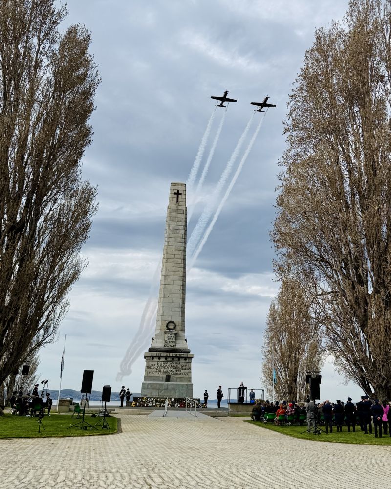 Two planes fly over the Hobart Cenotaph