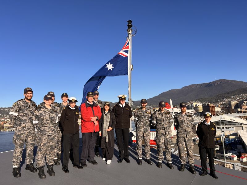 The Governor and Dr Walters with crew on board HMAS Canberra