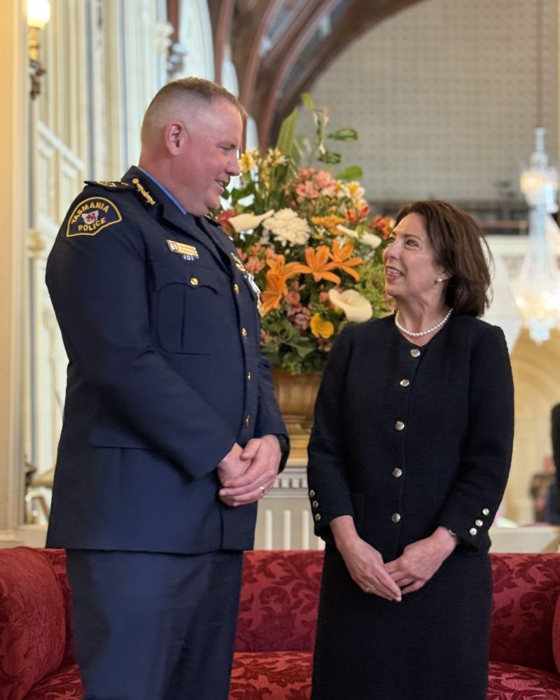 The Governor talks to a man
