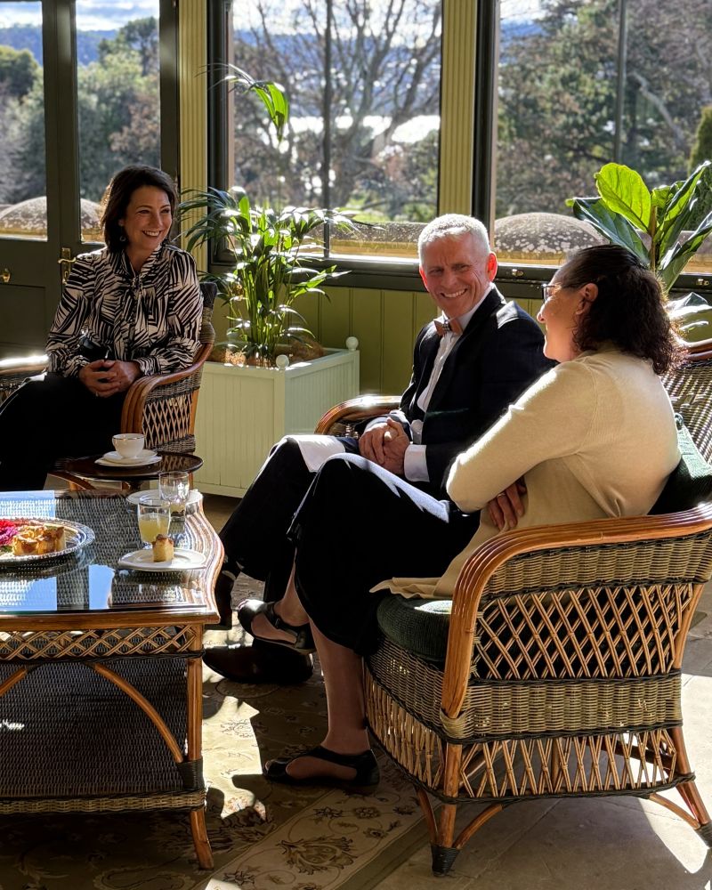 The Governor sits in the Conservatory talking with a man and a woman