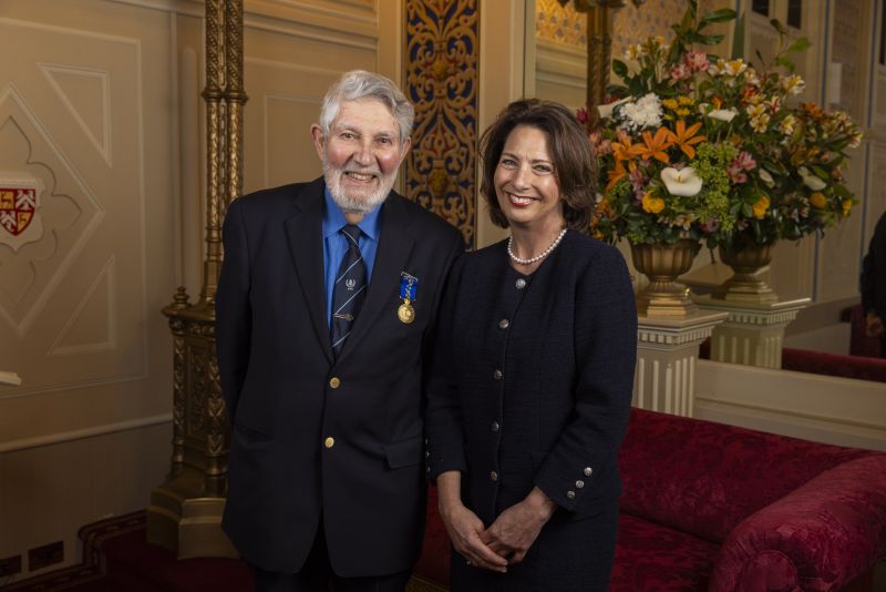 The Governor stands next to a man