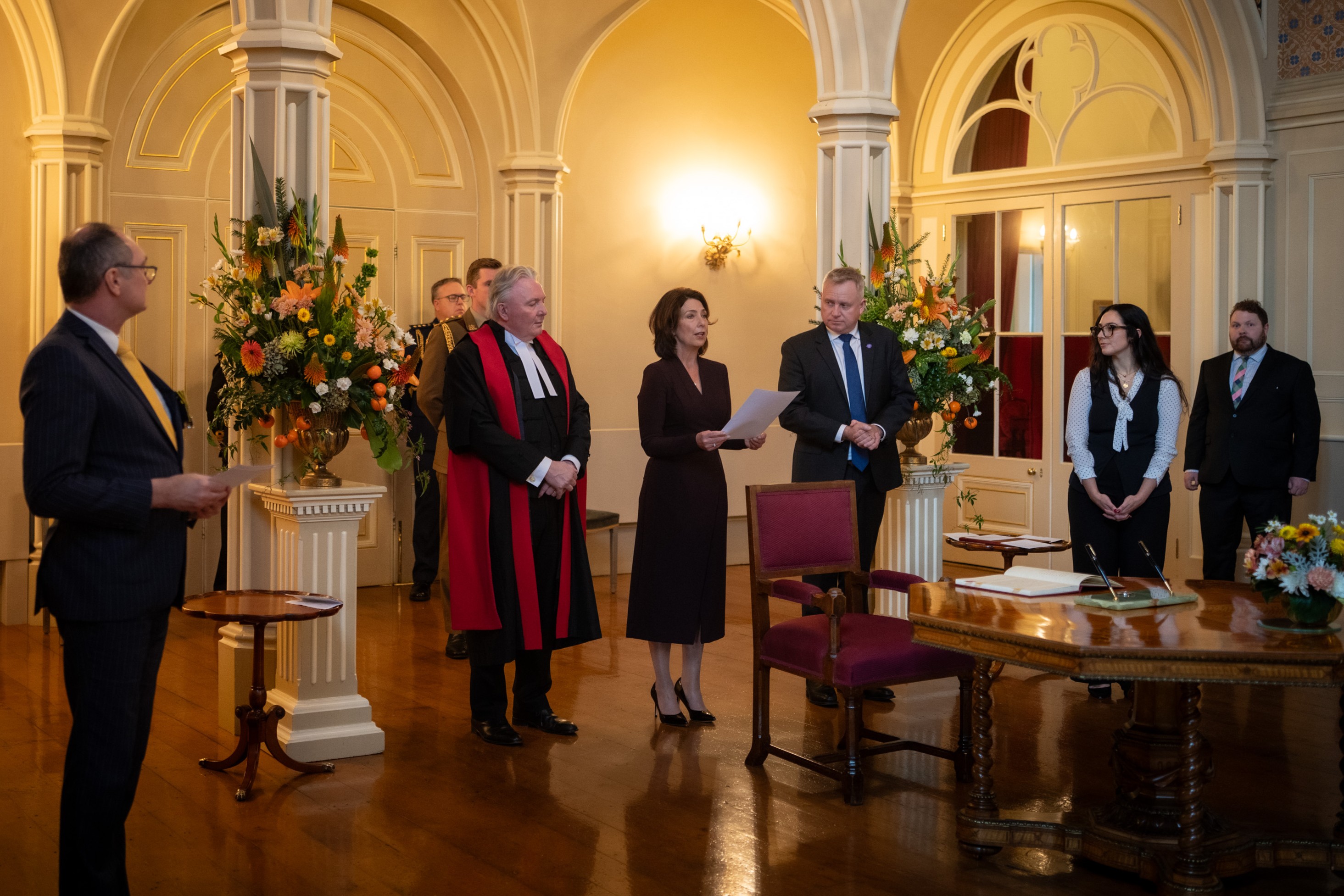 The Governor stands in the Government House ballroom during the swearing-in ceremony