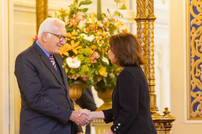 The Governor shakes the hand of a man
