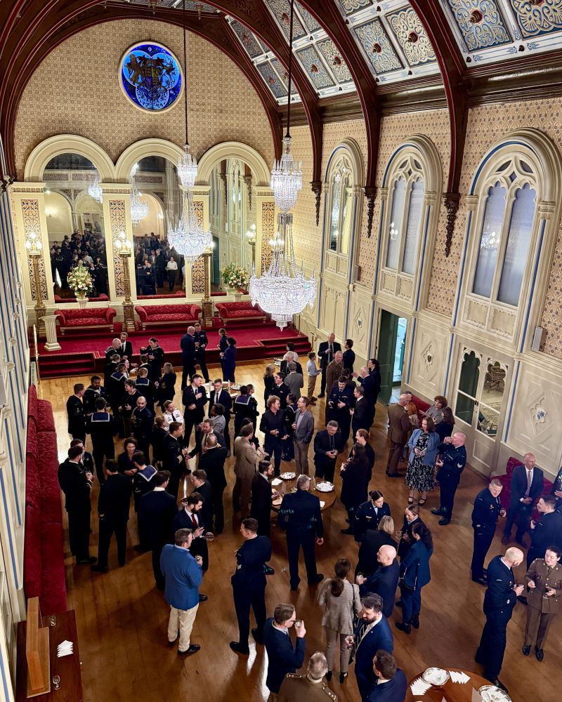 An aerial view of the Government House ballroom, filled with guests for a reception