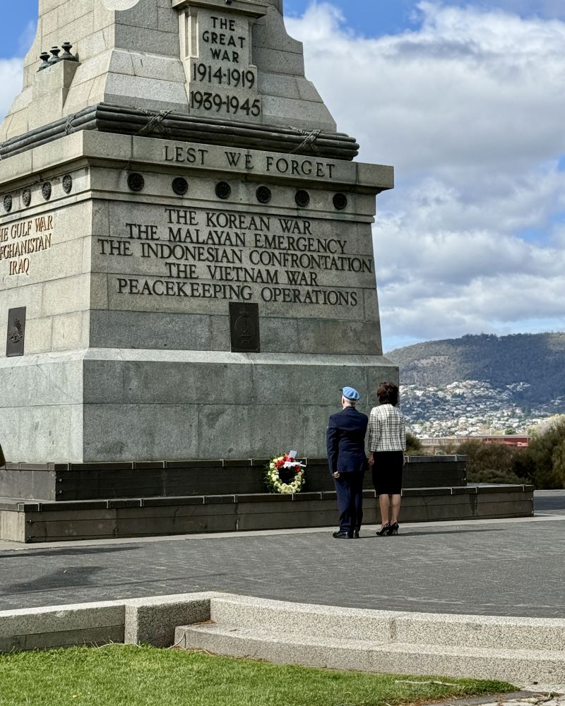 The Governor and a man lay a wreath at the Hobart Cenotaph