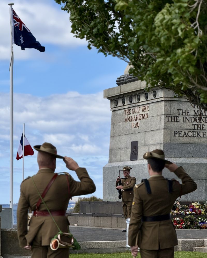 Australian Army officers salute at the Hobart Cenotaph
