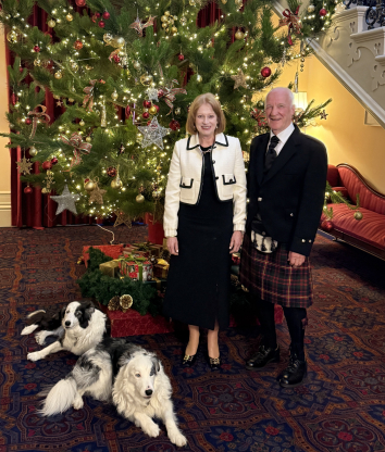 Her Excellency, Professor Chalmers, Oskar and Nala under the Christmas tree