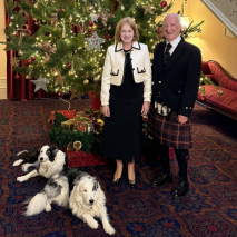 Her Excellency, Professor Chalmers, Oskar and Nala under the Christmas tree