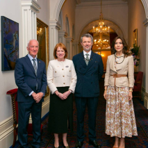 Her Excellency, Professor Chalmers and Their Majesties in the Main Hall at Government House