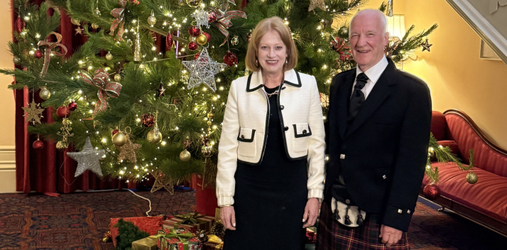 Her Excellency, Professor Chalmers, Oskar and Nala under the Christmas tree