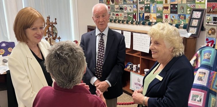 Her Excellency and Professor Chalmers speak to staff at the Central Highlands Visitor Centre