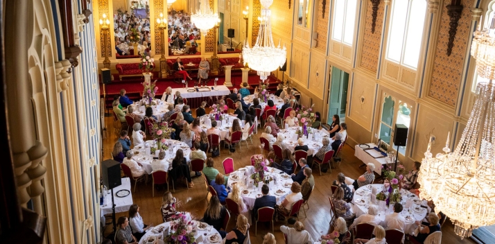 The Government House ballroom filled with tables for the luncheon.