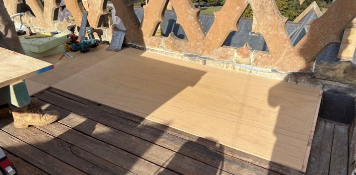 Wooden boards on top of the roof of the Clock Tower
