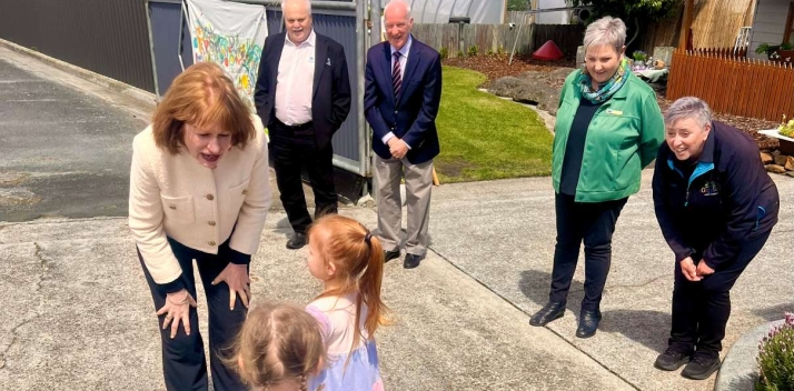 Her Excellency greeting two small children at an Early Learning Centre