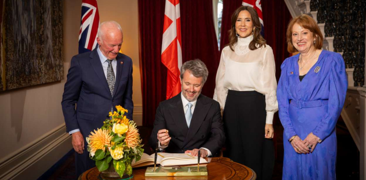 Her Excellency, Professor Chalmers and Their Majesties during the Guest Book signing.
